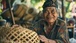 Elderly indigenous woman showing a pleased expression while holding a handmade basket