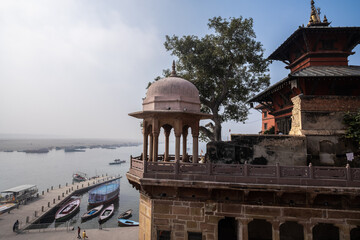 Wall Mural - Kathwala Temple, is Nepali Temple dedicated to Shiva. The architecture of the building stands in contrast to the buildings and other temples nearby and in Varanasi, India