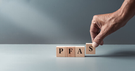 wooden blacks with pfas, per- and polyfluoroalkyl substances , concept of eternal or forever chemica