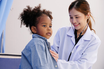 Doctor treating a young patient Pediatric doctor concept.