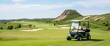 Cruise along the manicured fairways of a breathtaking golf course in a golf cart, soaking in the serene surroundings.