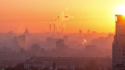 Wall Mural - Morning mist and red sky. Residential buildings on Leninskiy avenue, Stalin skyscrapers, smoking pipes and panorama of city at sunrise timelapse in Moscow, Russia. Close up. Aerial view from rooftop