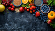   Arranged on a black stone surface with text on the left side, various fruits and vegetables showcase their vibrant colors