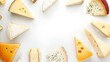 A frame of various slices of cheese on a white background, copy space