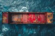 Red Container Floating in Body of Water