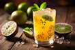 Homemade passionfruit soda served chilled with a slice of lime in bright afternoon light