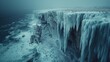   A cliff, partially covered in ice, extends from the edge of a body of water