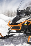 Fototapeta  - snowmobile in the winter mountains