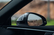 Modern car rear view mirror with drive assistance sensor