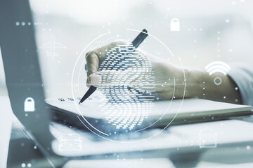 Aufkleber - Double exposure of abstract creative fingerprint hologram with hand writing in notepad on background with laptop, protection of personal information concept