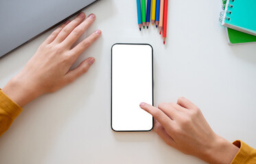 Poster - Person Using Blank Smartphone Flat Lay Next to Laptop