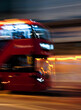 fast moving Red bus