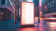 Mockup. Vertical advertising display on the street. Standalone, illuminated advertising column with a blank, white poster mockup against an urban background.