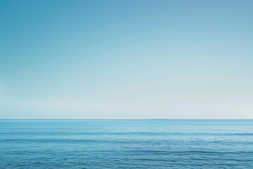 Wall Mural - The ocean is calm and clear, with no visible waves or ripples