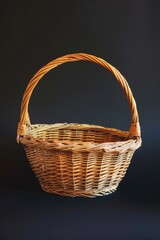 Poster - A wicker basket on a dark backdrop, suitable for various design projects