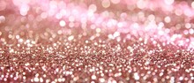   A Tight Shot Of A Pink Backdrop Speckled With Numerous Tiny White And Pink Glitter Dots Scattered At Its Summit