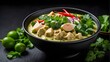 creamy green curry bowl isolated on a black background, showing a variety of healthful vegetarian dishes