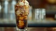 Dirty soda. A glass of root beer float with a scoop of vanilla ice cream on top