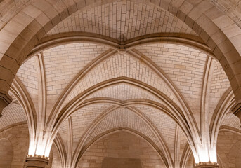 Wall Mural - Vaulted ceiling supported by massive pillars in the Hall of the Men-at-arms, Conciergerie, former courthouse and prison in Paris city center, France