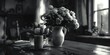 Simple black and white photo of flowers in a vase. Suitable for various design projects
