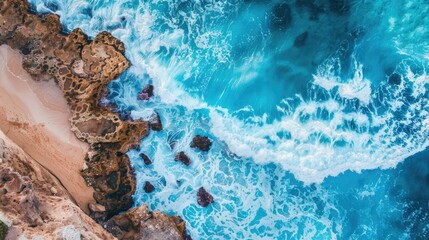 Poster - A beautiful aerial view of a sandy beach and the ocean. Perfect for travel and vacation concepts