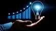 glowing light bulb with stock graph business background