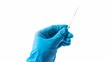 Isolated on a white background, a hand wearing a blue glove holds a dental toothpick.