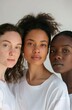 A portrait of three women, each with distinctive features and skin tones, standing in unity, their expressions reflecting the natural beauty and diversity of human identity.
