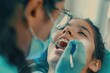 © Elena - close up of a dentist fitting a patient with braces