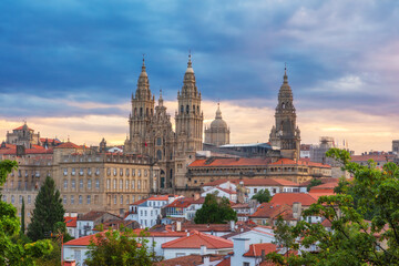 Wall Mural - Aerial view of Santiago de Compostela city with Cathedral and buildings at sunrise, Galicia, Spain. Galician gothic church. Popular touristic landmark