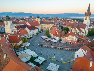 Poster - Sunrise panorama of Piata Mica in Sibiu, Romania