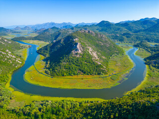 Wall Mural - Meander of Rijeka Crnojevica river leading to Skadar lake in montenegro