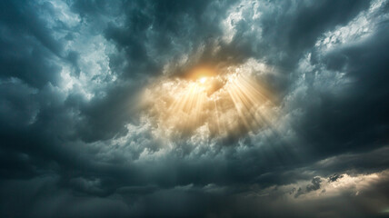 Wall Mural - The sun's rays breaking through dark storm clouds, creating a dramatic contrast in the sky.