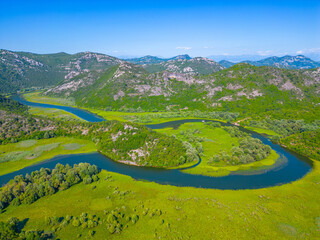 Wall Mural - Meander of Rijeka Crnojevica river leading to Skadar lake in montenegro