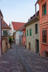 Canvas Print - Colourful street in the old town of Sighisoara, Romania