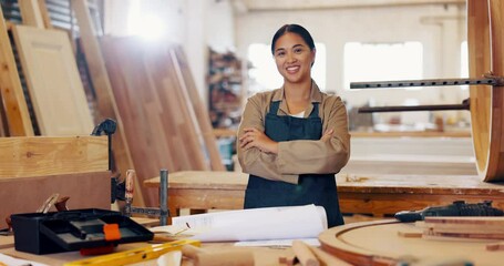 Poster - Woman, face and wood workshop for production manufacturing for furniture carpenter, building or handmade. Female person, portrait and arms crossed in warehouse for renovation, lumber or equipment