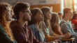 © EmmaStock - a group of students sitting in a classroom