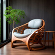 Wooden armchair with white cushion, minimalist interior.