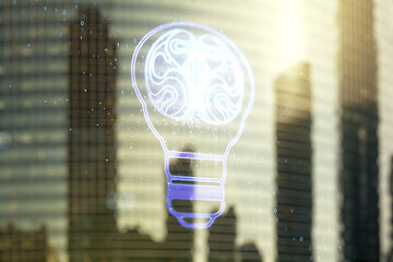 Poster - Double exposure of abstract virtual creative light bulb hologram with human brain on modern skyscrapers background, idea and brainstorming concept