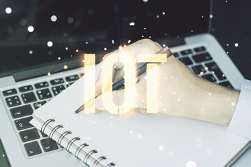 Poster - Double exposure of creative IOT hologram with hand writing in notebook on background with laptop, research and development concept