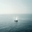 A lone sailboat navigating the vast ocean capturing the timeless romance of sea travel