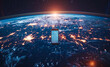 Smartphone device in space with global network and bright city lights