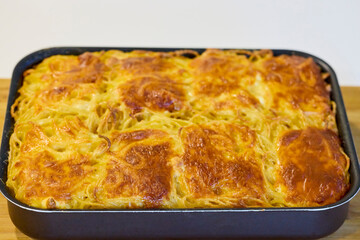 pasta with cheese and egg cooked in the oven.