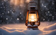 Glowing lantern on a snowy evening against a defocused forest background, symbolizing warmth and winter magic