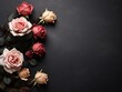 Beautiful roses on black background, flat lay. Space for text