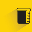 lab beaker icon with shadow on yellow background