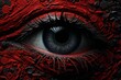 Close-up of a creepy human eye with a red paint detail on the eyelids and dark eyelashes