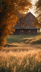 Wall Mural - an old barn sitting next to a field and trees at sunset