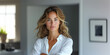 © Andrii Zastrozhnov - A serious adult businesswoman exudes elegance and professionalism, embodying confidence and style