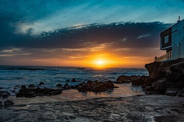 Sticker - beautiful golden sunset at the beach of el cotillo, in la oliva, the fuerteventura island, spain